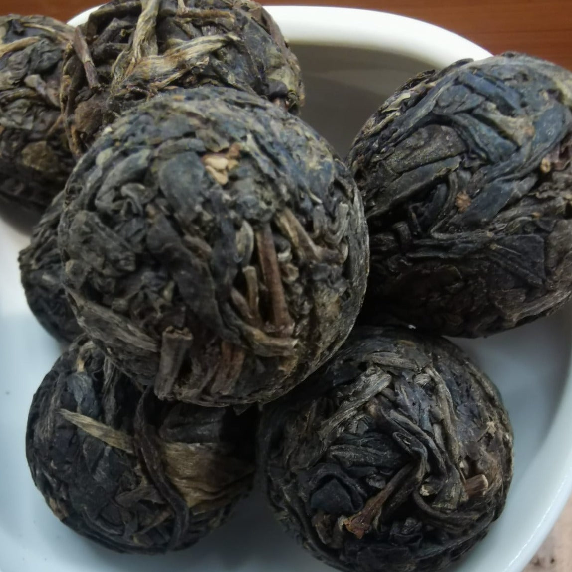 ENCHANTED BEAUTY® Old Village Sheng PuEr 2011 vintage Dragon Peals 12s a box