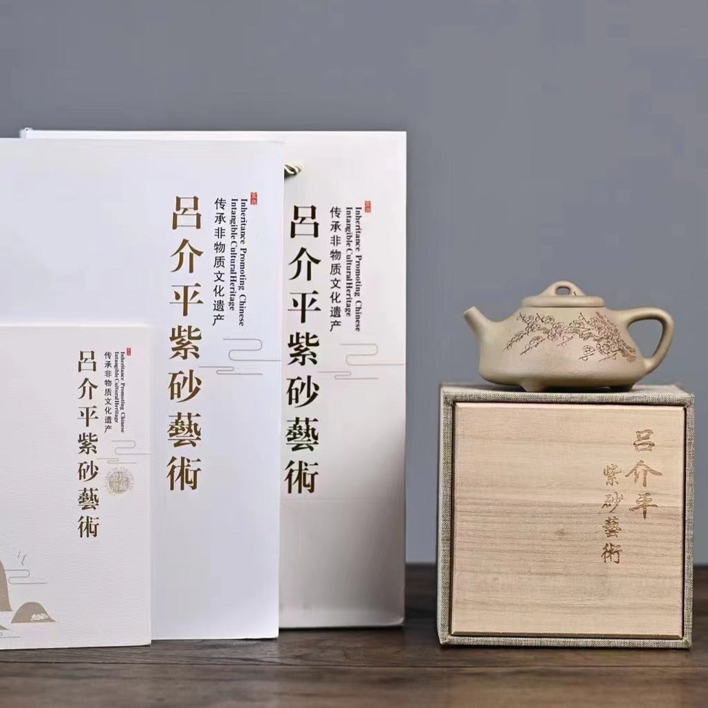 Zisha teapot Zi Ye Shi Piao, handmade by artist Level 3, LV Jie 