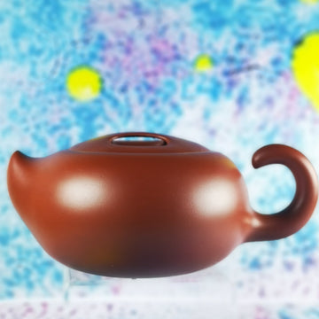 Zisha teapot Niu Qi Chong Tian, handmade by Artist Level 2, CAO Lan Fang L2-2011