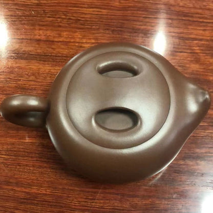 Zisha teapot Niu Qi Chong Tian, handmade by Artist Level 2, CAO Lan Fang L2-2011