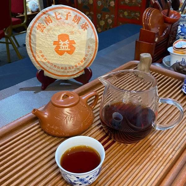 Daetea (Da Yi) Shou PuEr teacake 7572-301 红大益普洱熟茶 2003 Round Red label